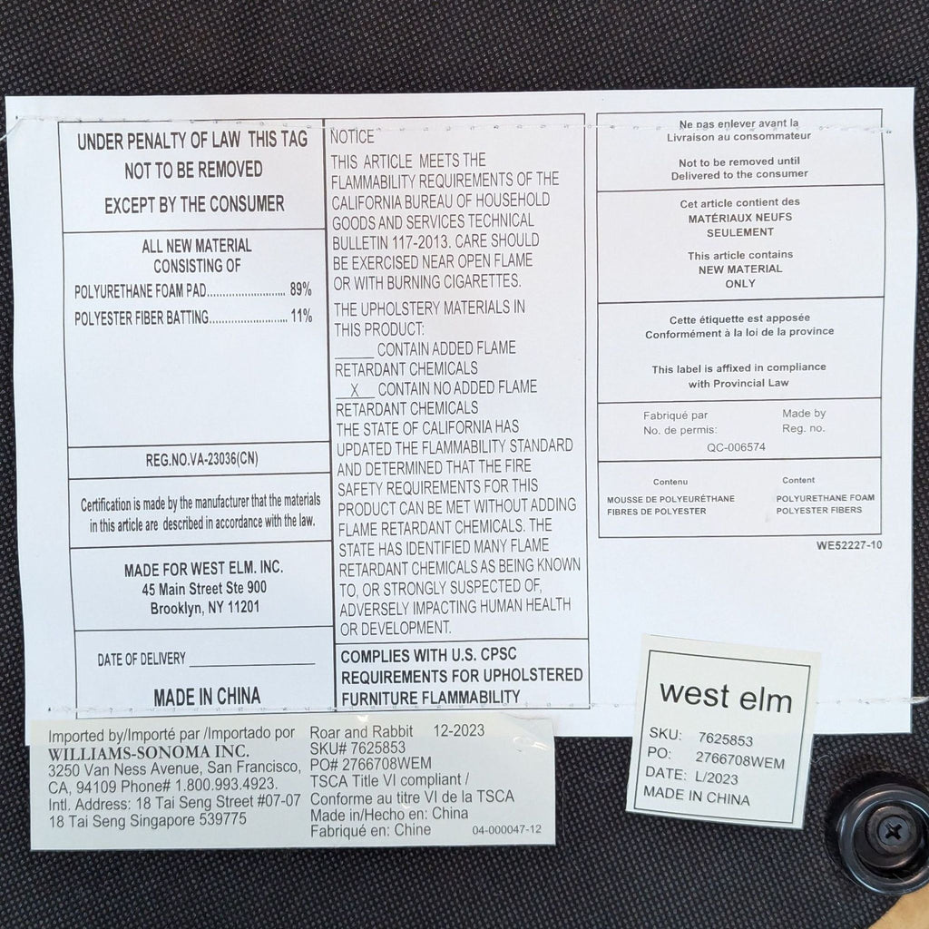 Label on ottoman indicates brand, materials, and fire safety info.