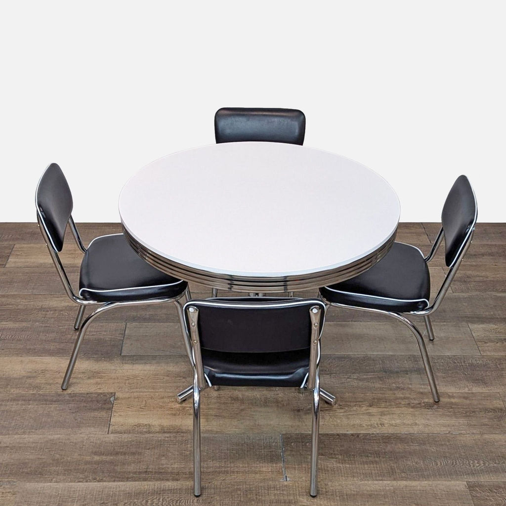 Five-piece Coaster dining set with white piped black cushions.