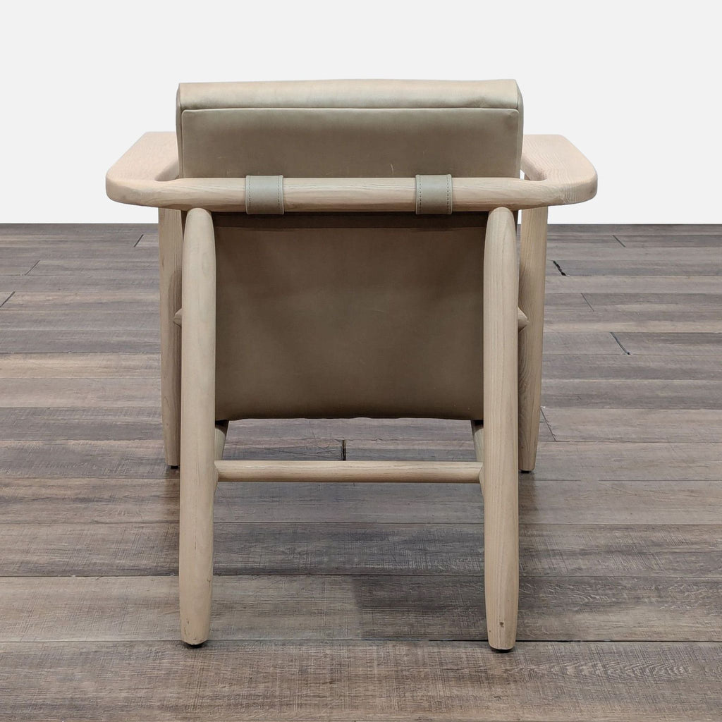 Back view of the Arnett chair, highlighting the sturdy wood construction.