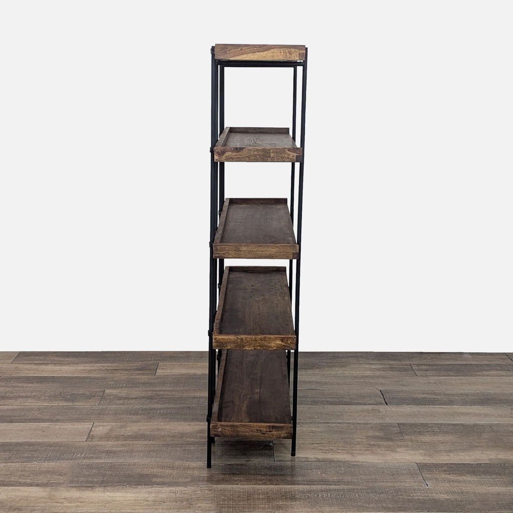 2. Side view of mango wood bookshelf with slender black iron frame, emphasizing the sleek structure.