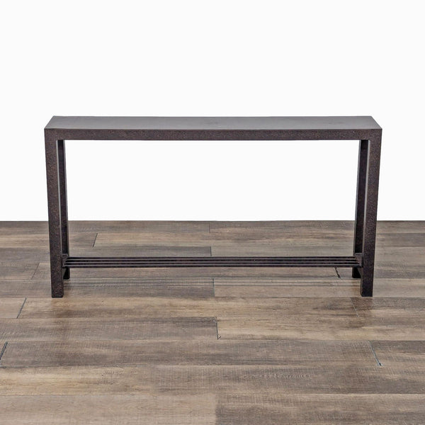 Reperch console table with a minimalist metal frame design on wooden flooring.  
