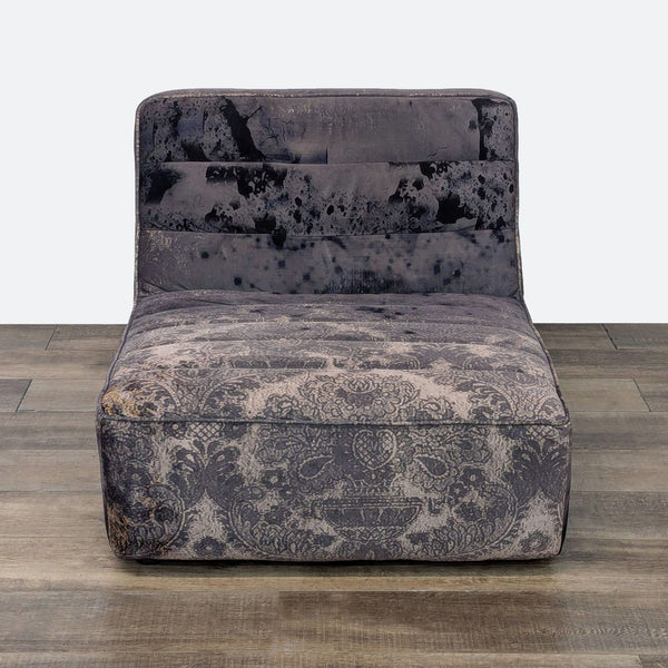 Timothy Oulton lounge seat with distressed velvet and ribbed cushioning.