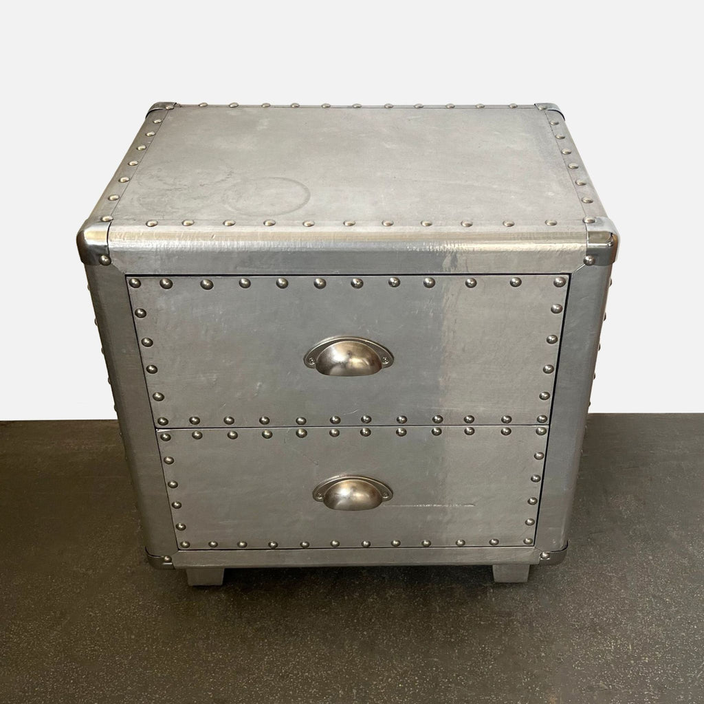 Compact Reperch end table with a sleek metal design and textured rivet accents.