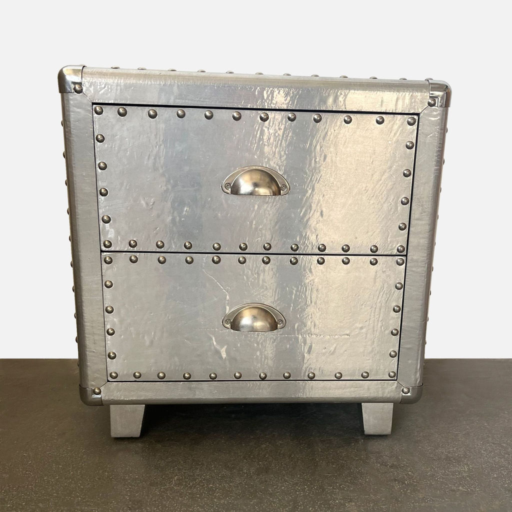 Reperch metal end table features two drawers with rivet details and metal cup handles.