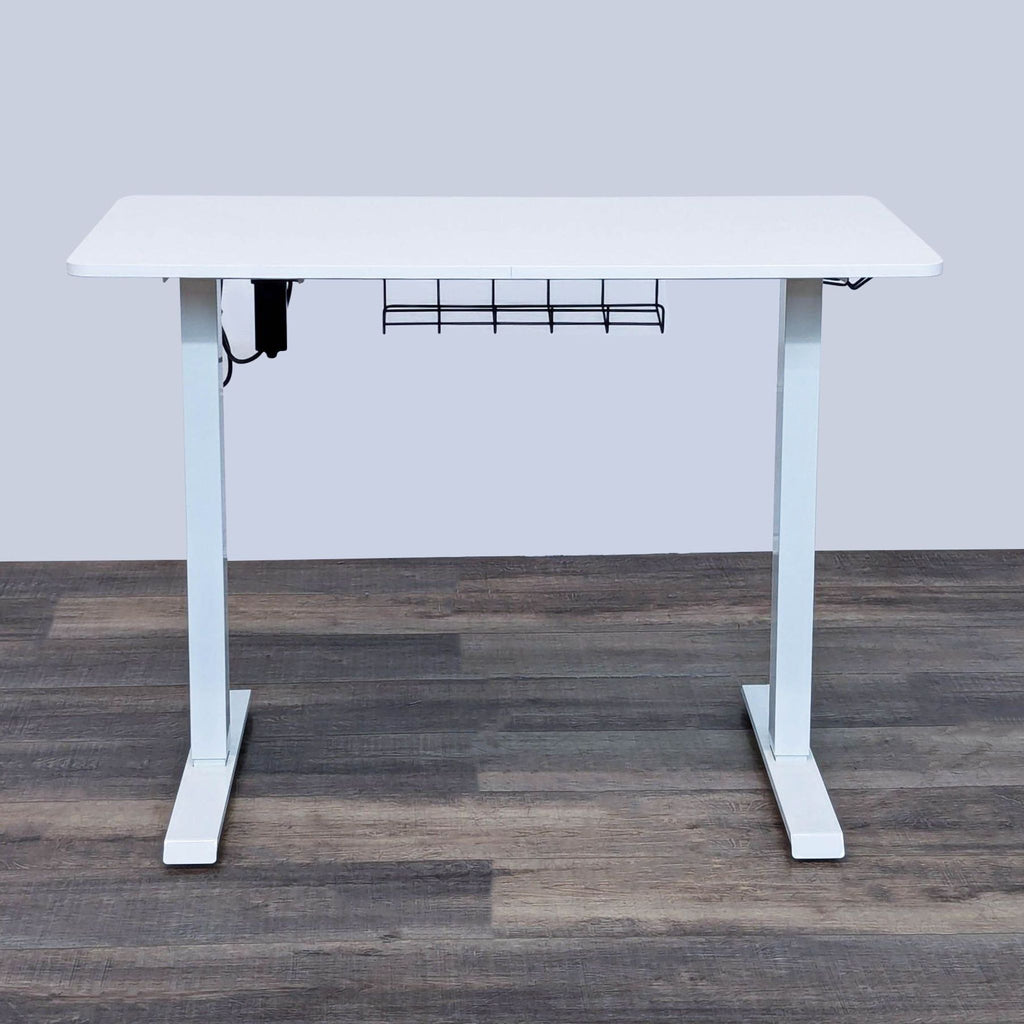 White Reperch desk featuring adjustable height and cable system.