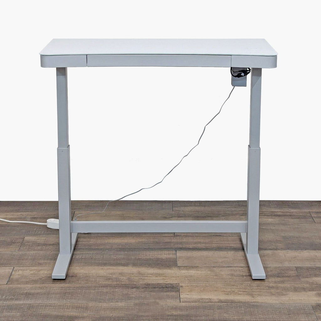 ActiveLife™ electronic standing desk with a sleek design and ergonomic features.  
