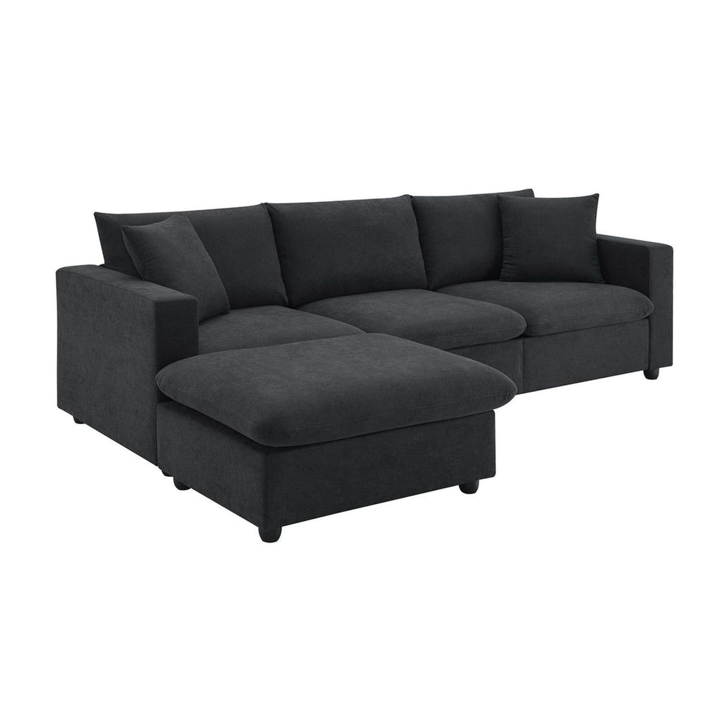 a white couch with a black couch cushion 