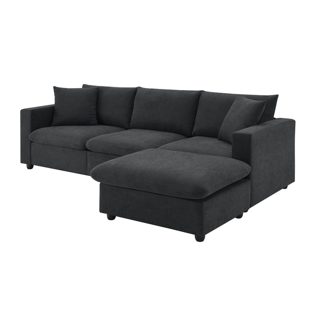 a white couch with a black couch cushion 