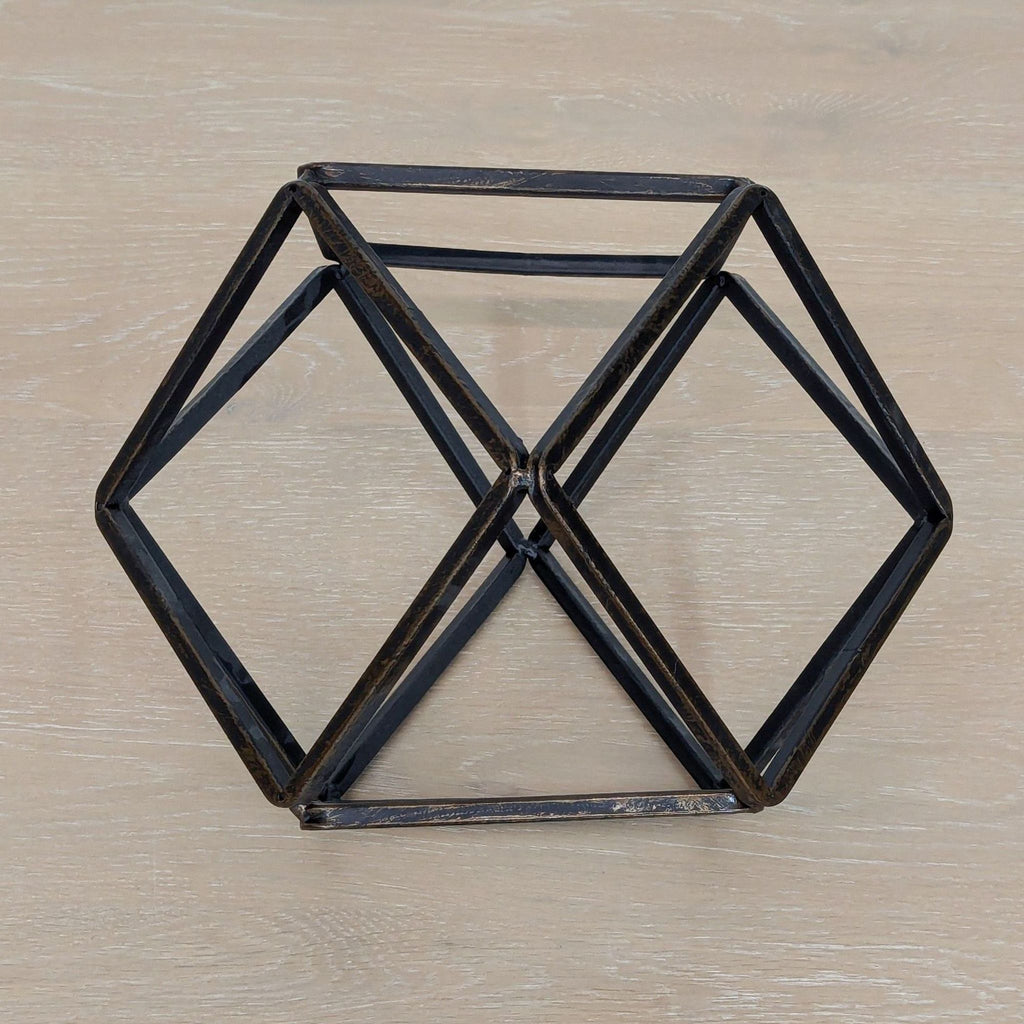 a wooden table with a black and white picture of a person 