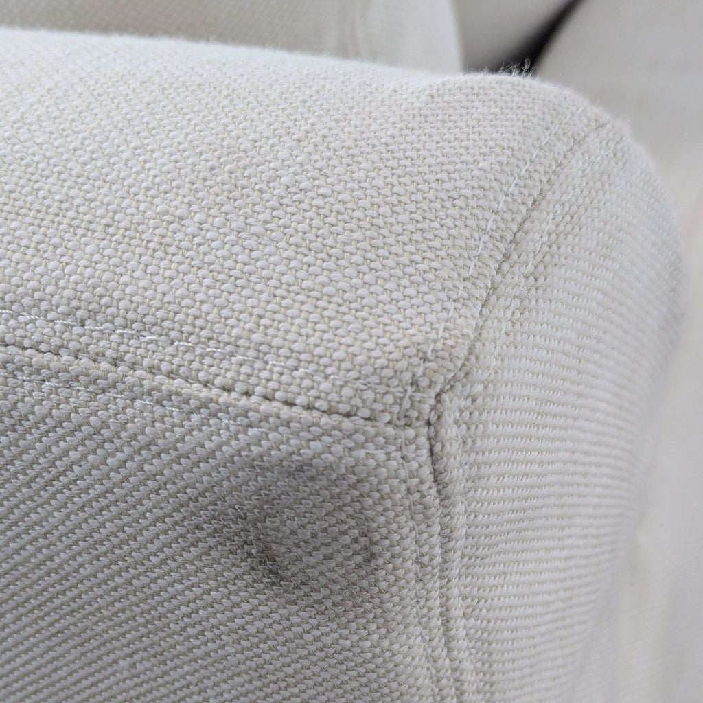 a white pillow with a black cover 