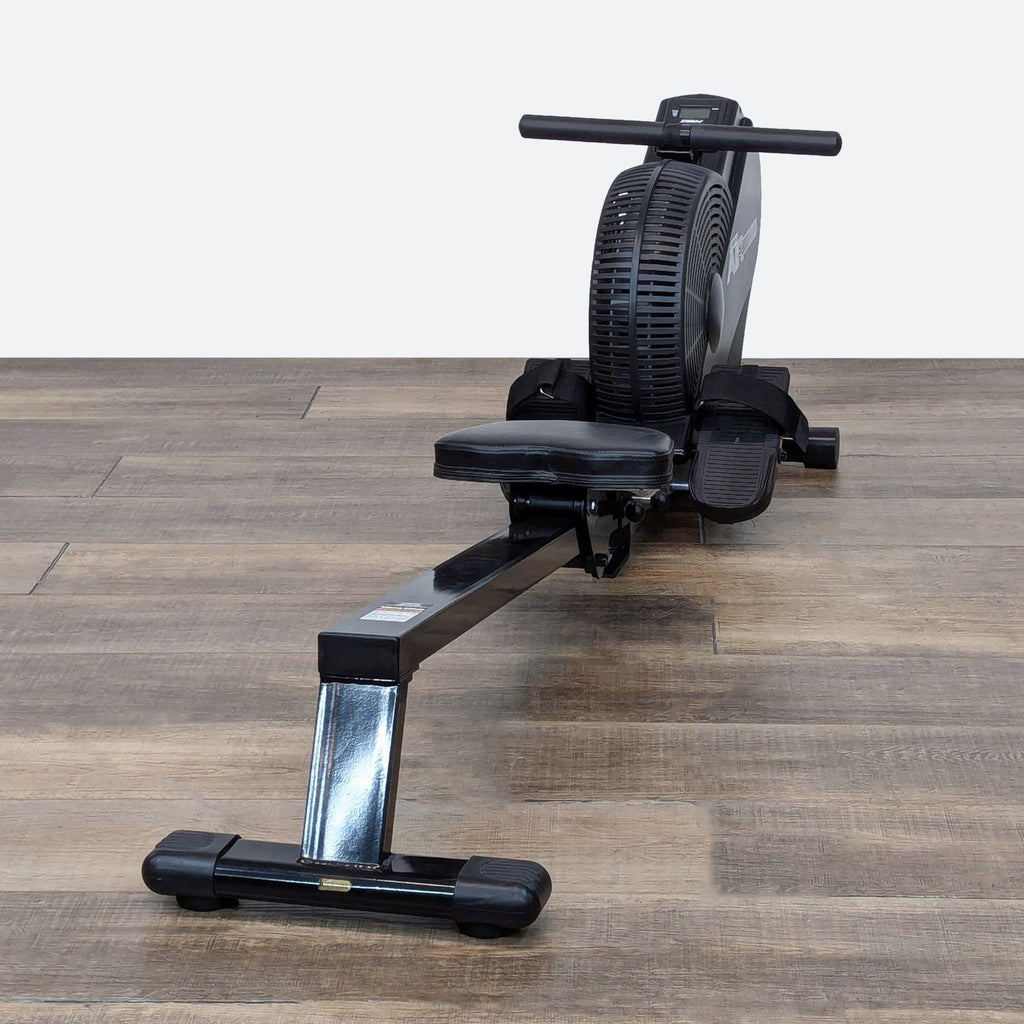 a black chair with a remote control on it 