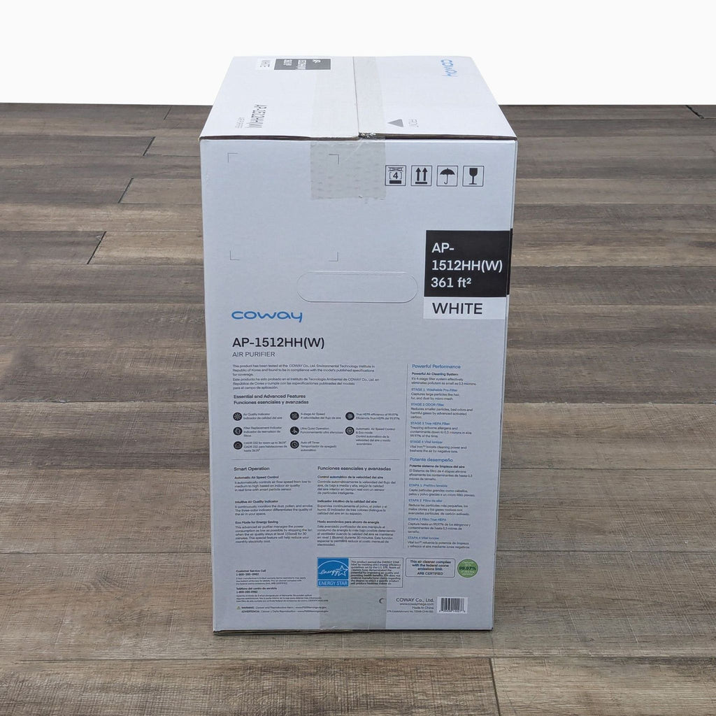 a white refrigerator with a black box on top 