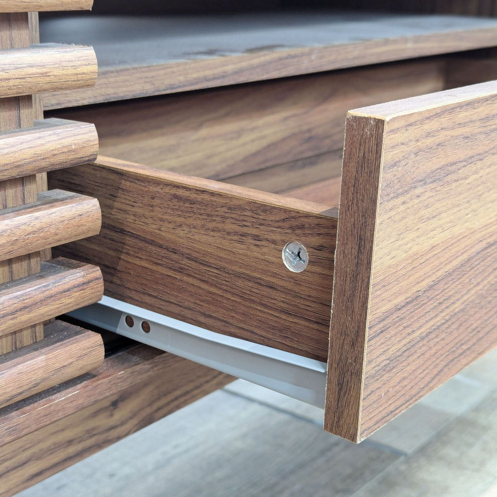 a wooden bench with wooden handles and wooden boards 