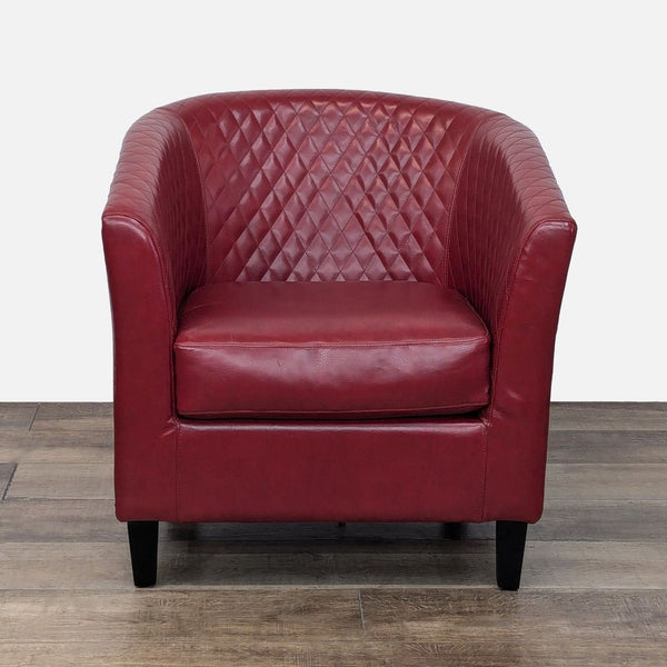 a red chair with a red handle on it 