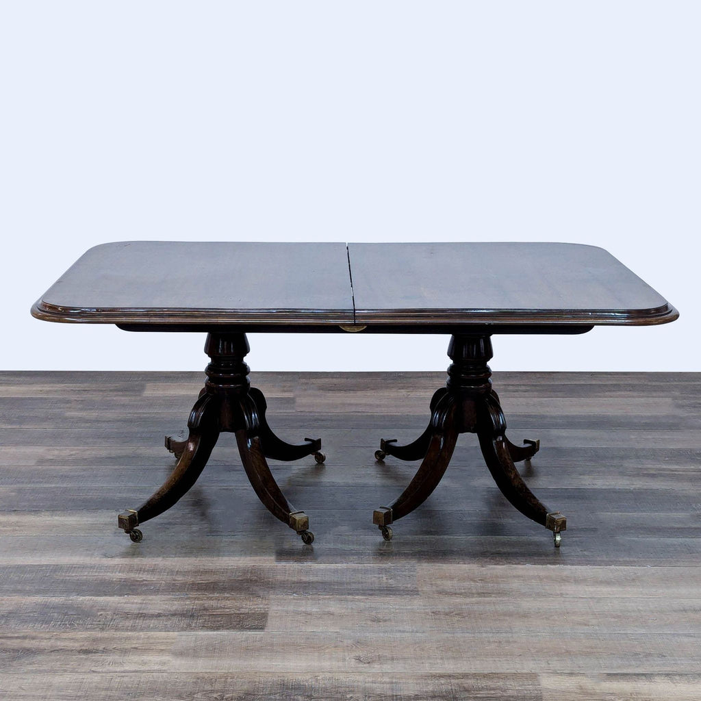 a table with a chair and a table cloth 