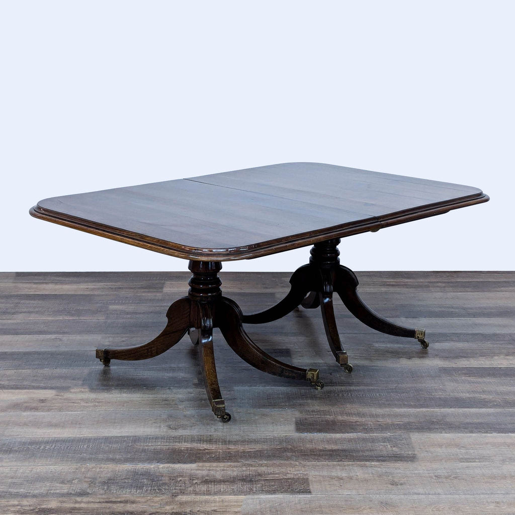 a table with a chair and a table cloth 