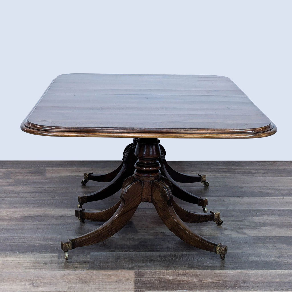 a table with a chair and a table cloth 