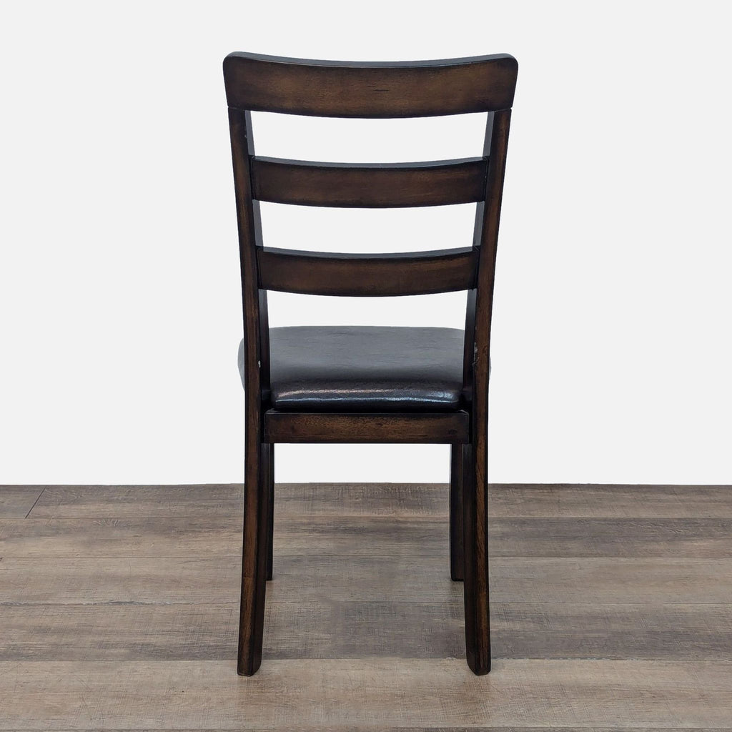 a wooden chair with a wooden floor 