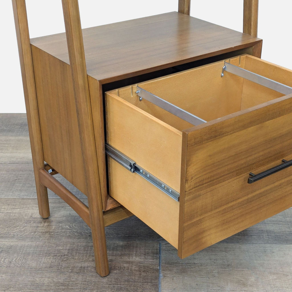 a wooden chair with a wooden handle and a wooden shelf 