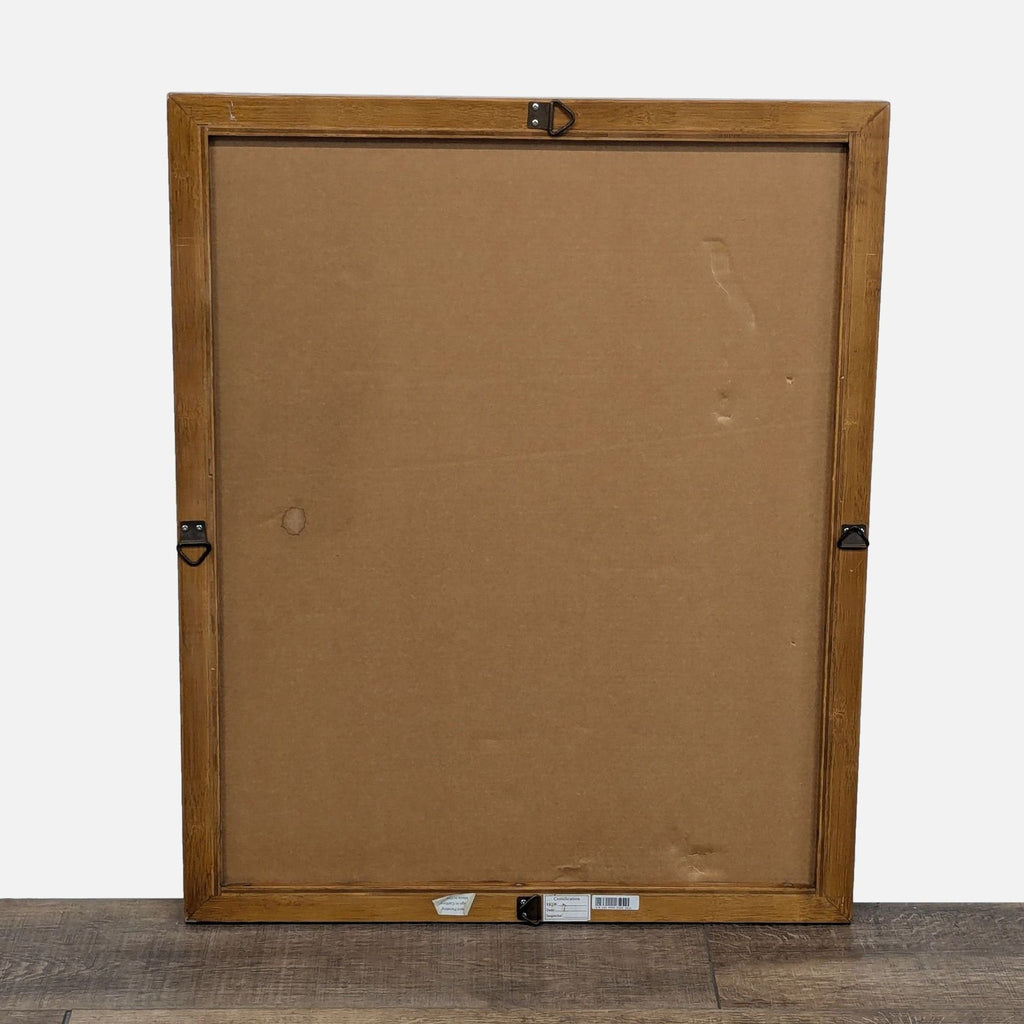 a box with a sticker on it sitting on a floor 