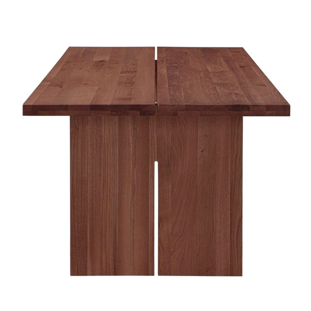 a wooden wooden table with a wooden head board 