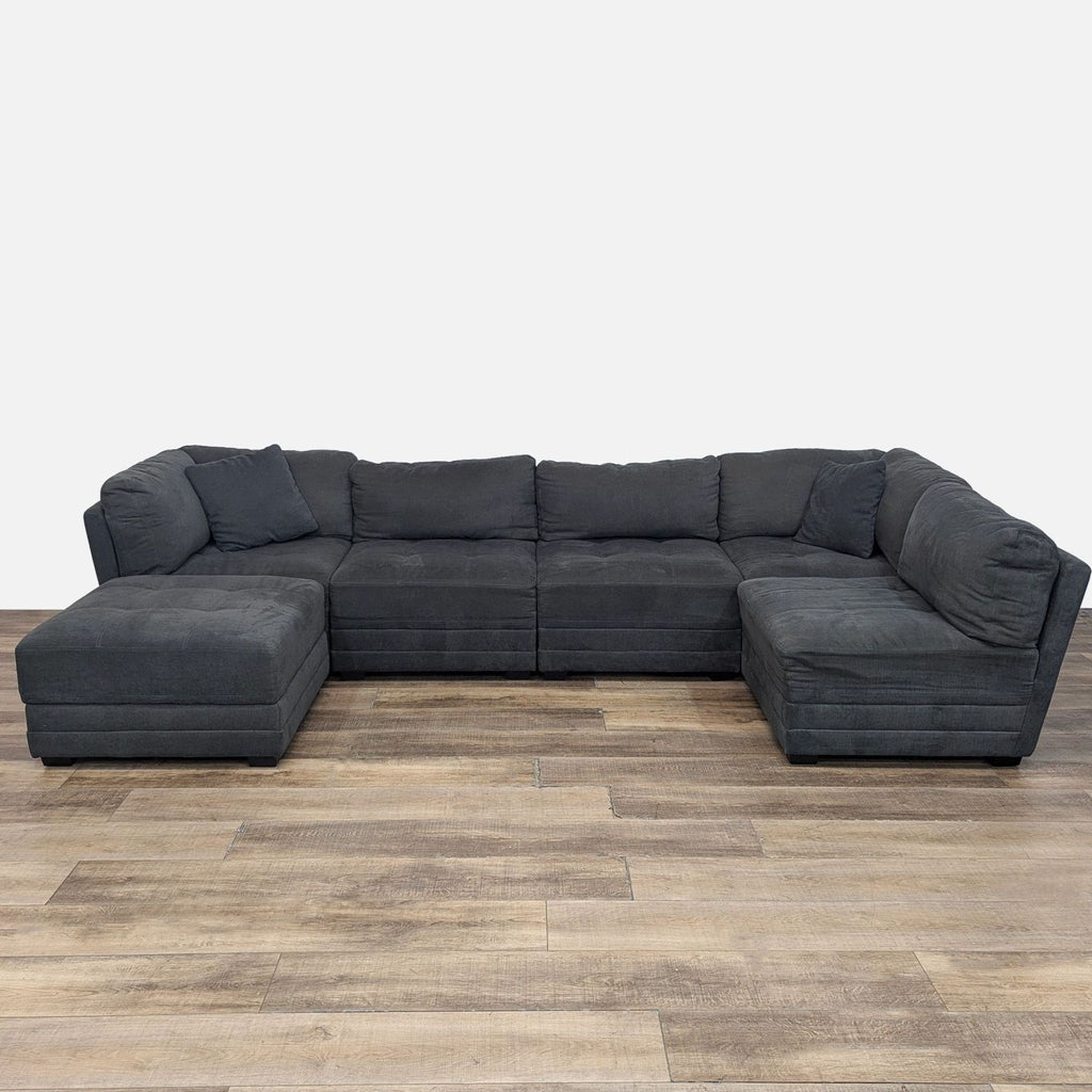 a couch with a black couch cushions and a black and white couch 