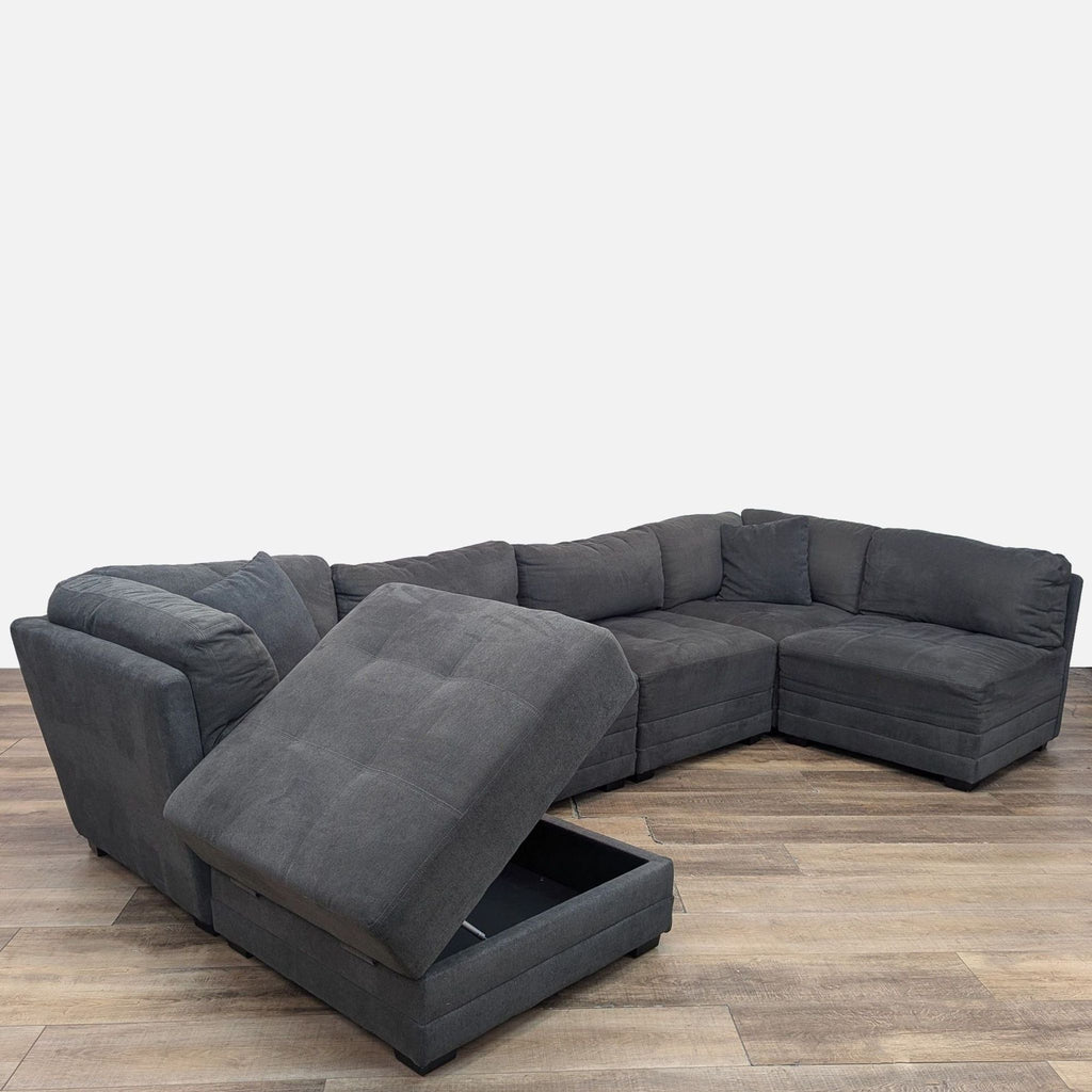 a couch with a black couch cushions and a black couch cushion 