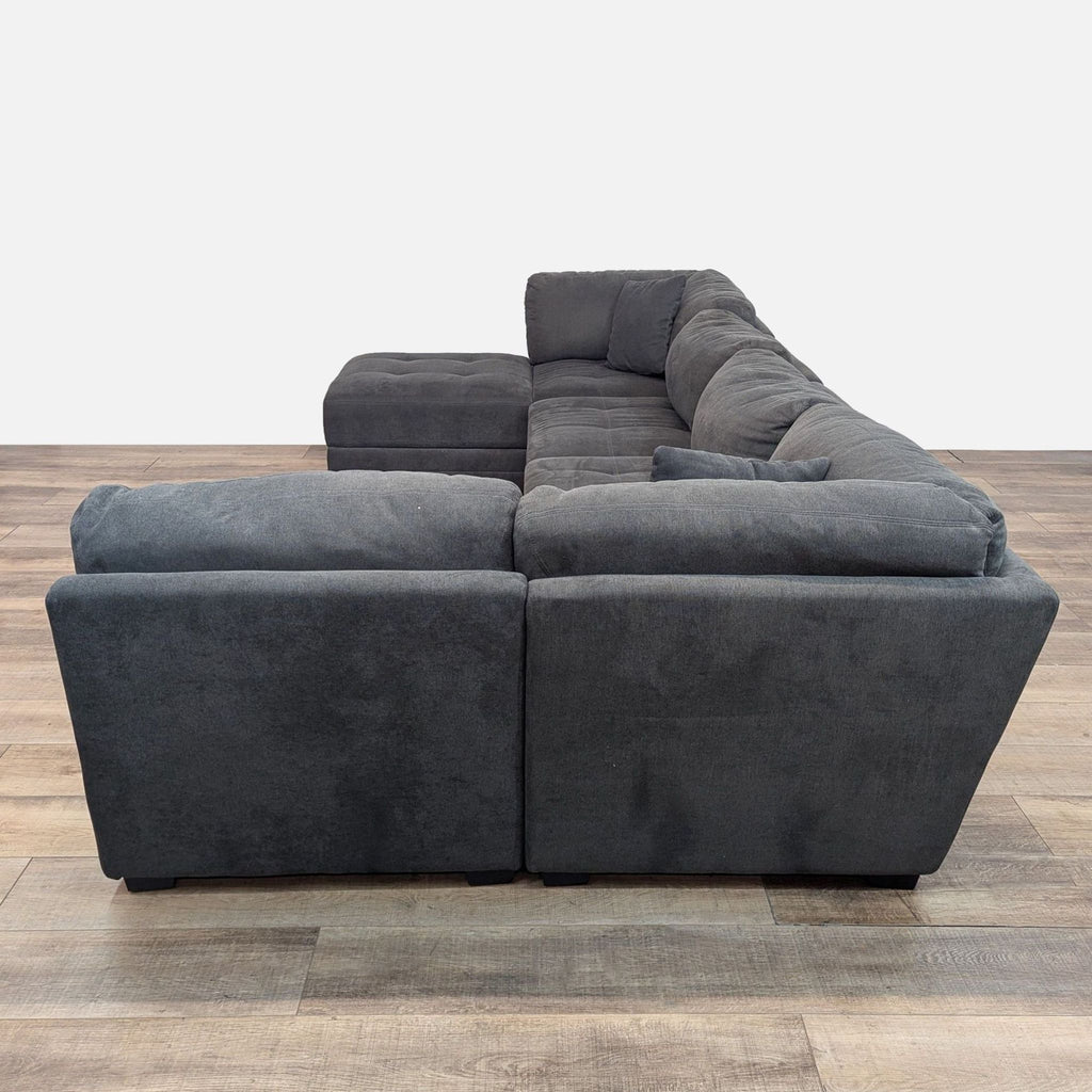 a black leather couch with a black leather seat 
