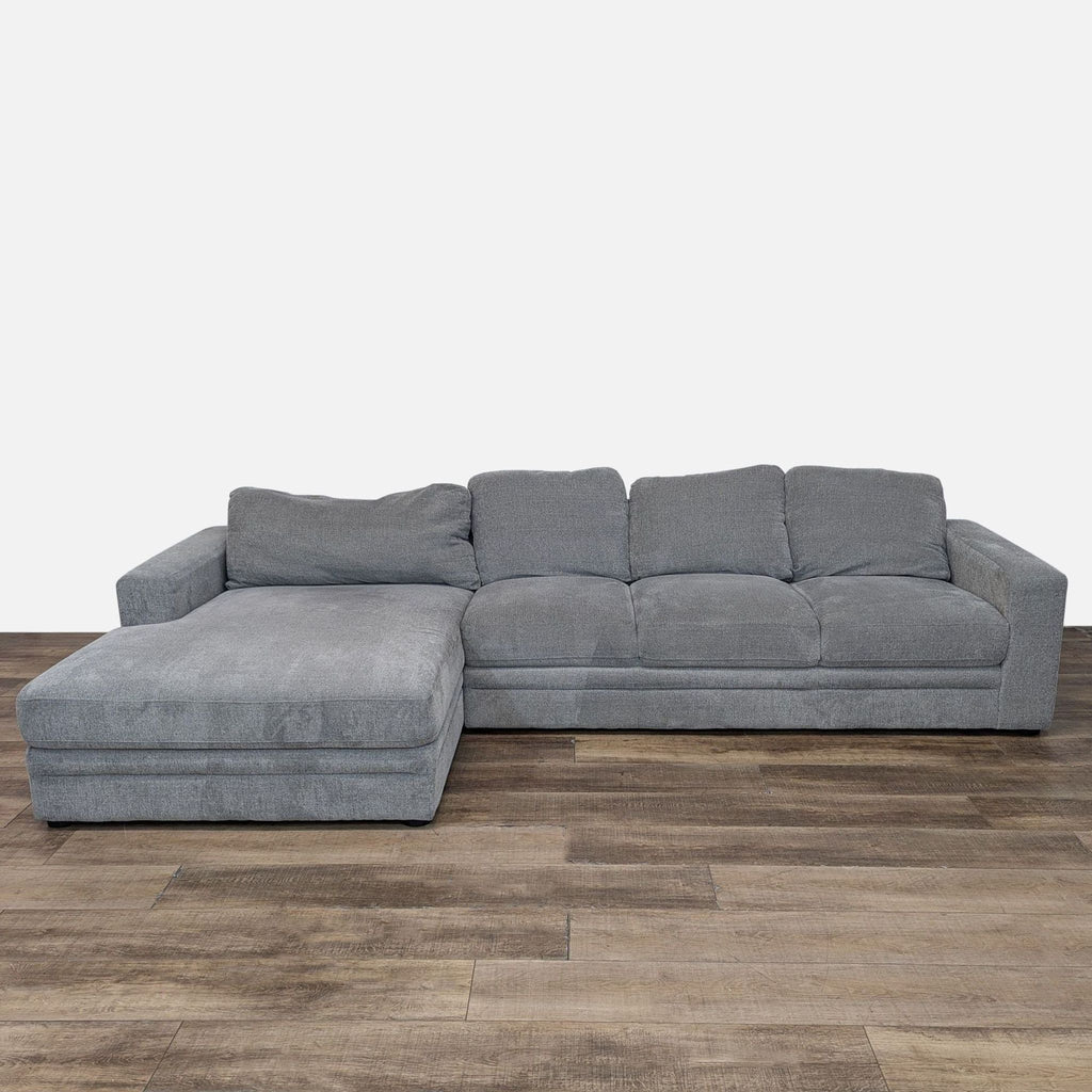 a couch with a black couch cushions and a black couch 