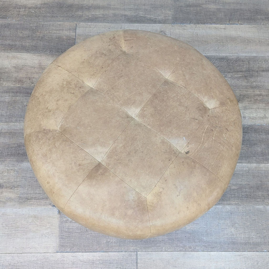 a white frosted cake sitting on top of a wooden table 