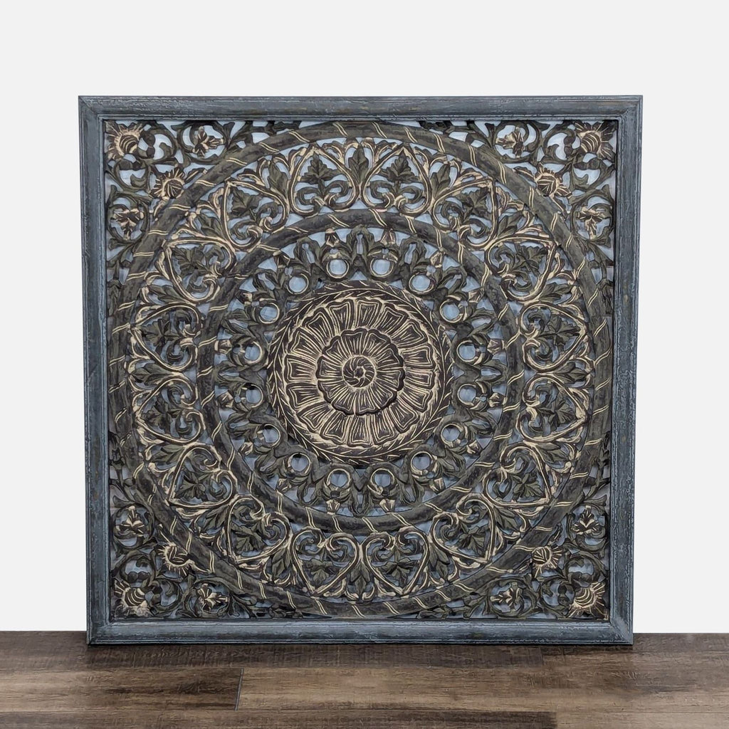 a wooden table with a carved wooden face 