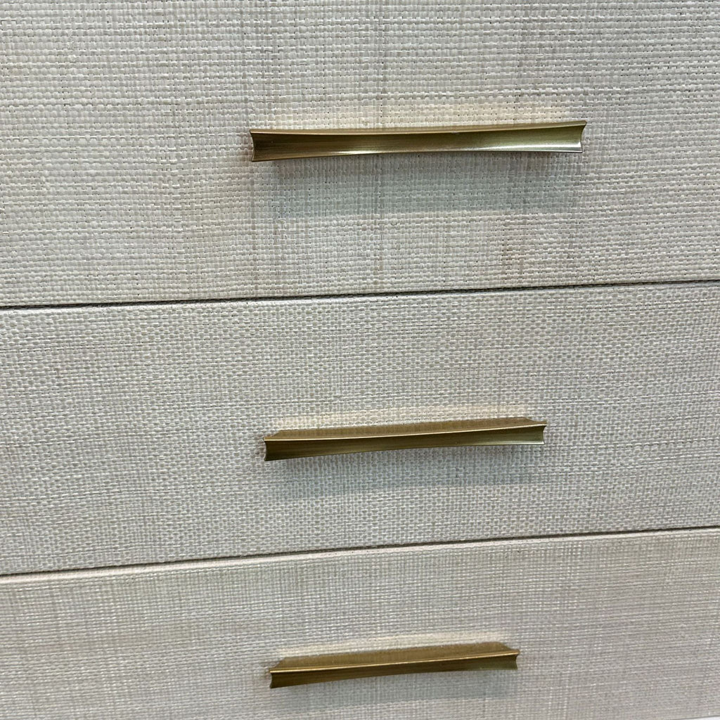 a wall mounted mirror with a pair of scissors 