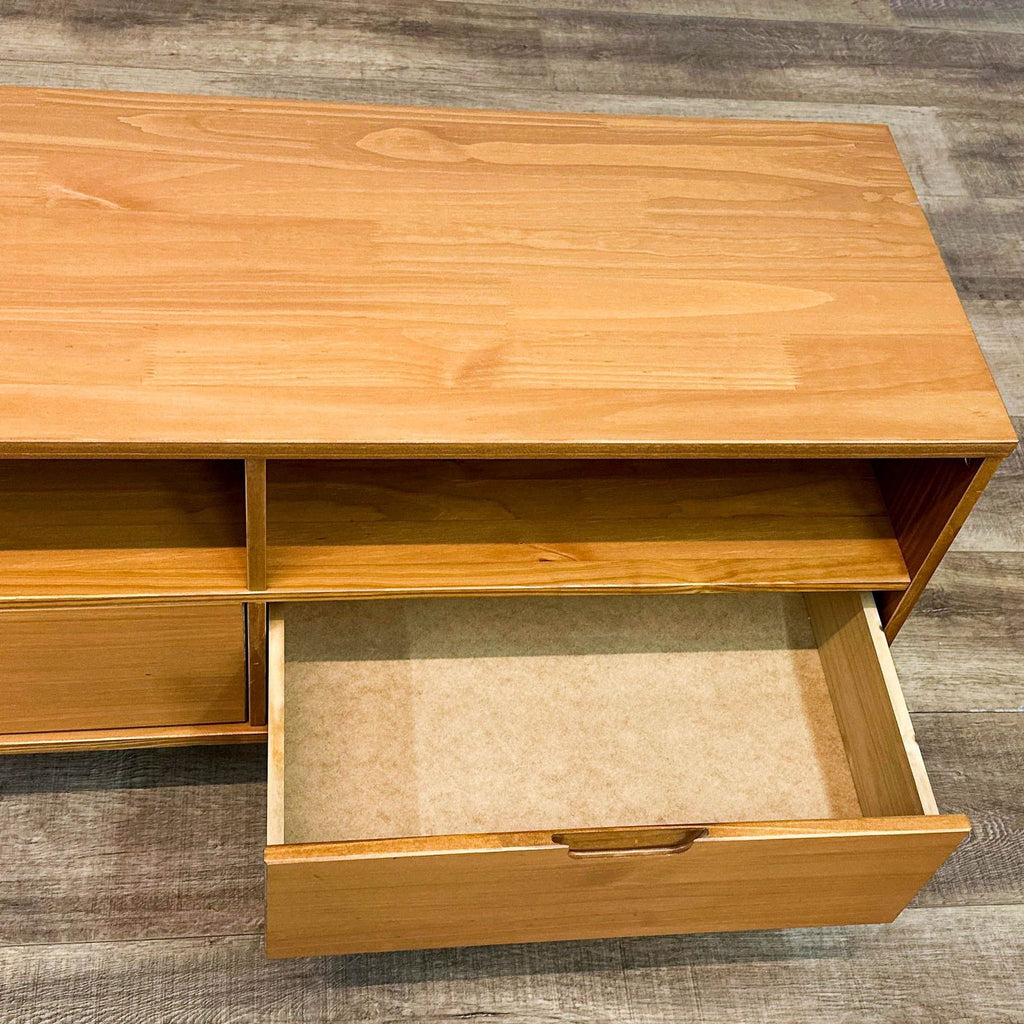a wooden box with a wooden handle and a wooden shelf 