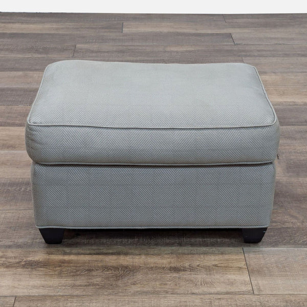 a black and white photo of a black and white couch 