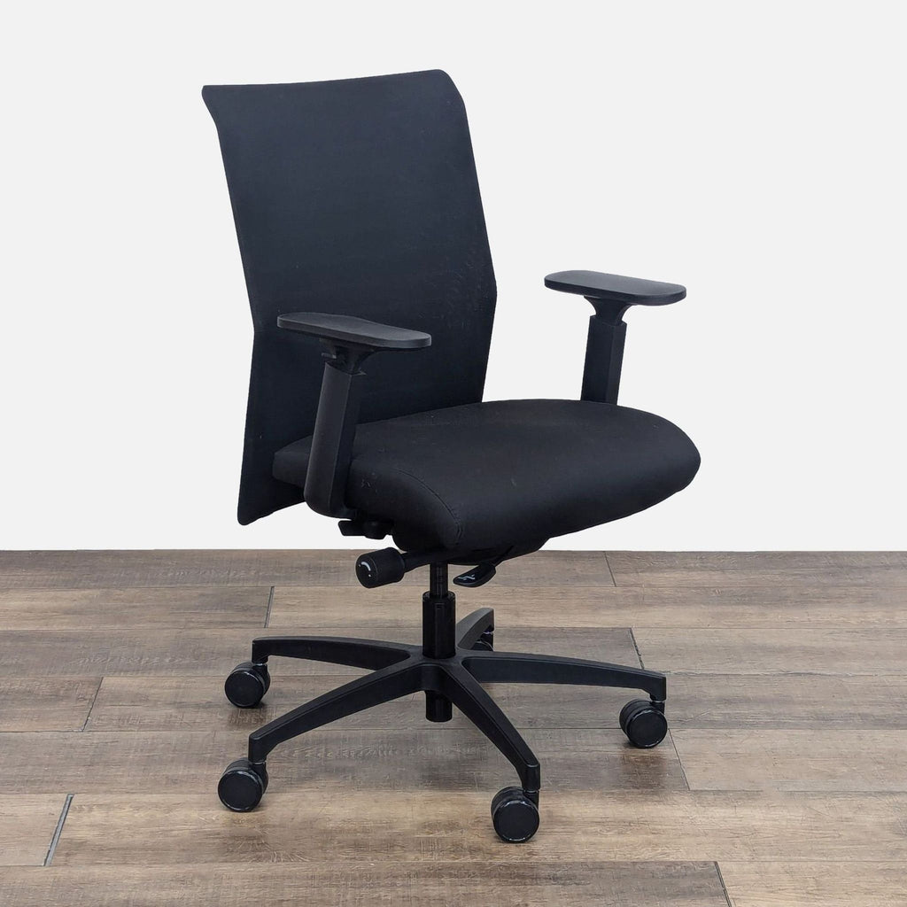Angled view of Proform Executive chair highlighting armrests and swivel casters.