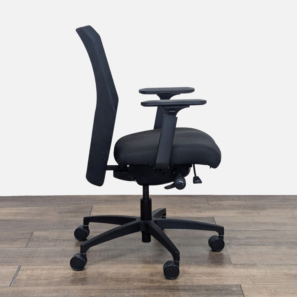 Side view of Proform Executive chair showcasing mid-back design and swivel base.