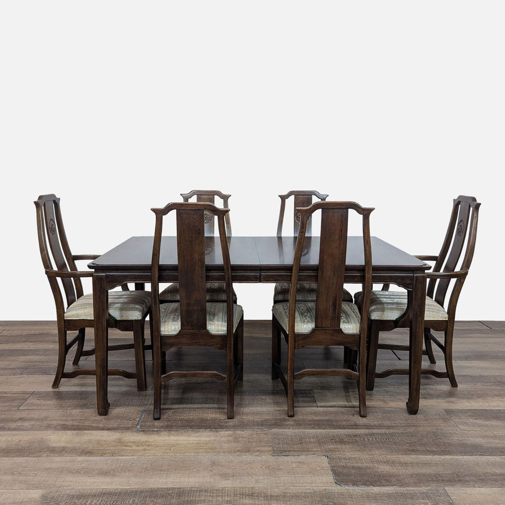 Reperch dining set with wood table, three leaf inserts, six upholstered side chairs, two arm chairs.