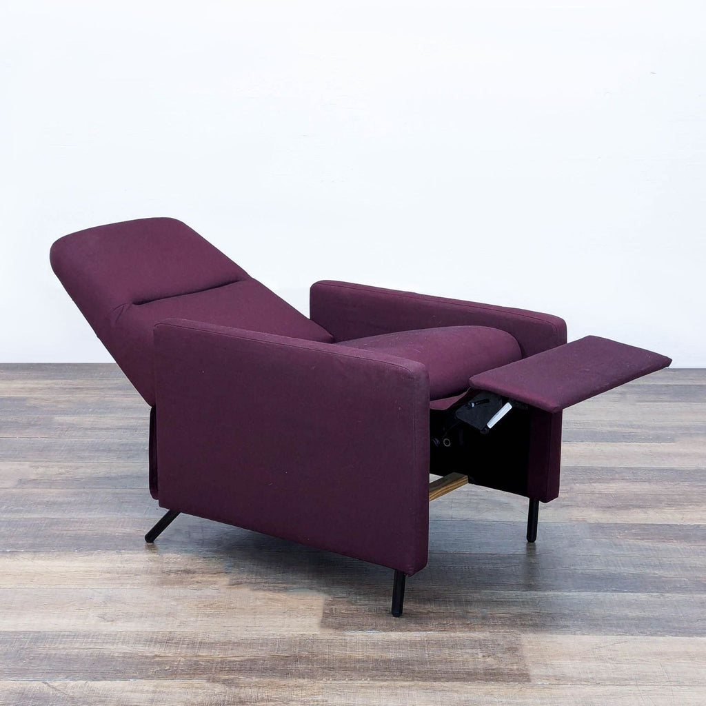 Side view of the Gistad recliner, fully extended with purple upholstery.