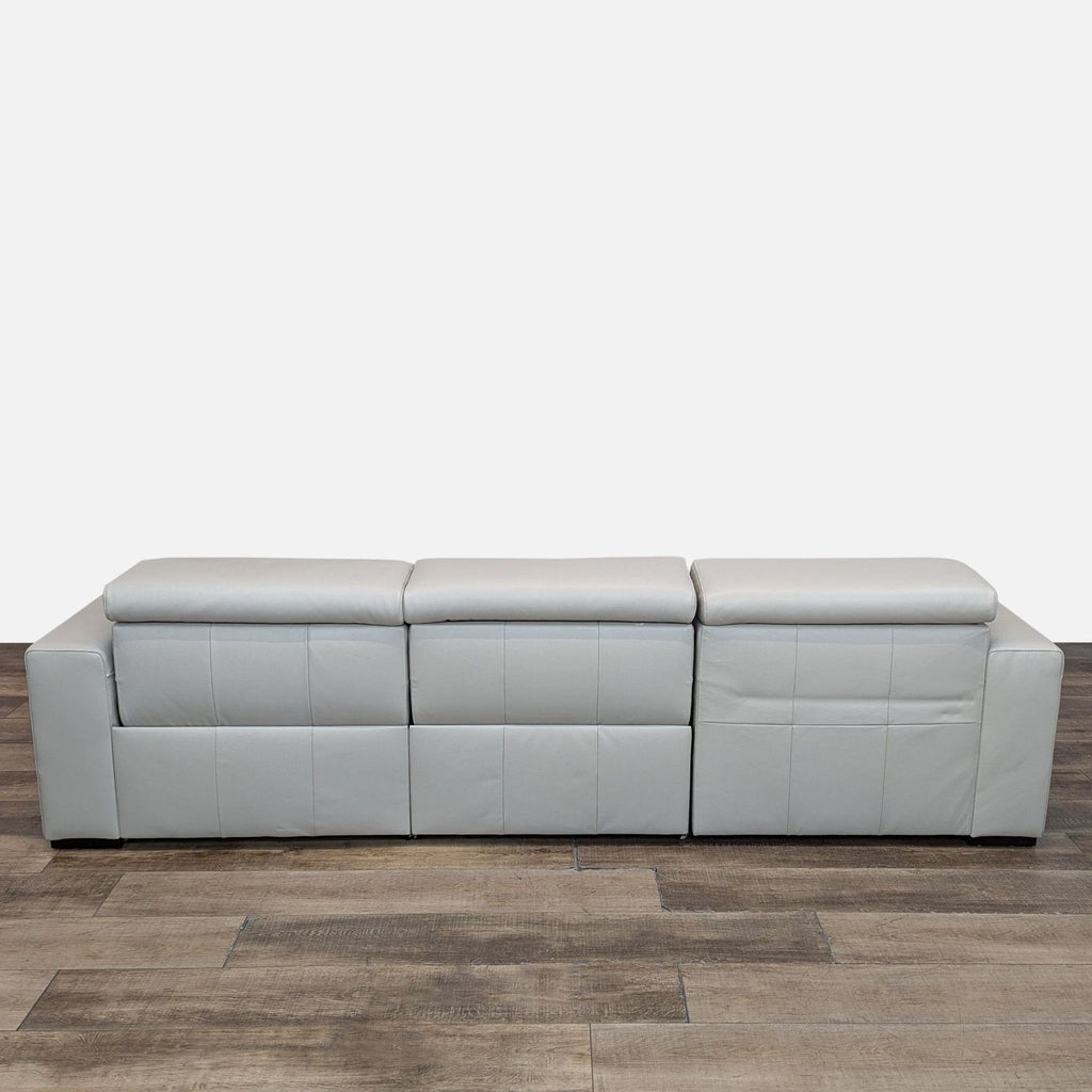 Macy’s Nevio Leather Reclining Sectional with Chaise and Articulating Headrests