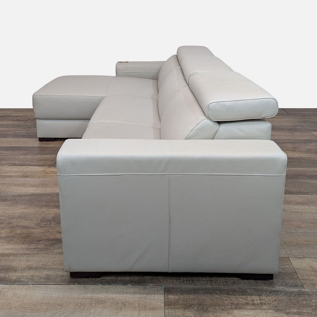 Macy’s Nevio Leather Reclining Sectional with Chaise and Articulating Headrests