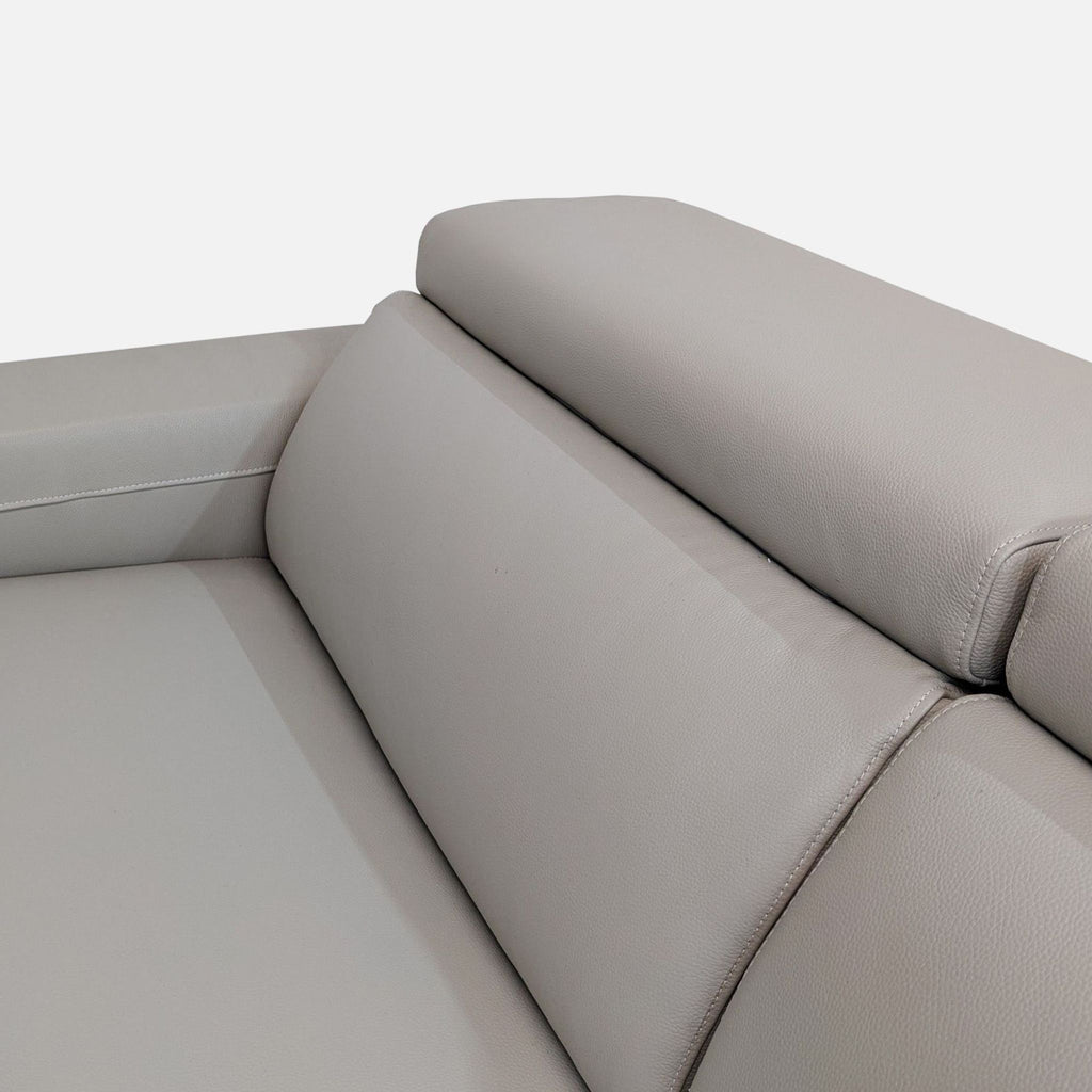 Macy’s Nevio Leather Reclining Sectional with Chaise and Articulating Headrests