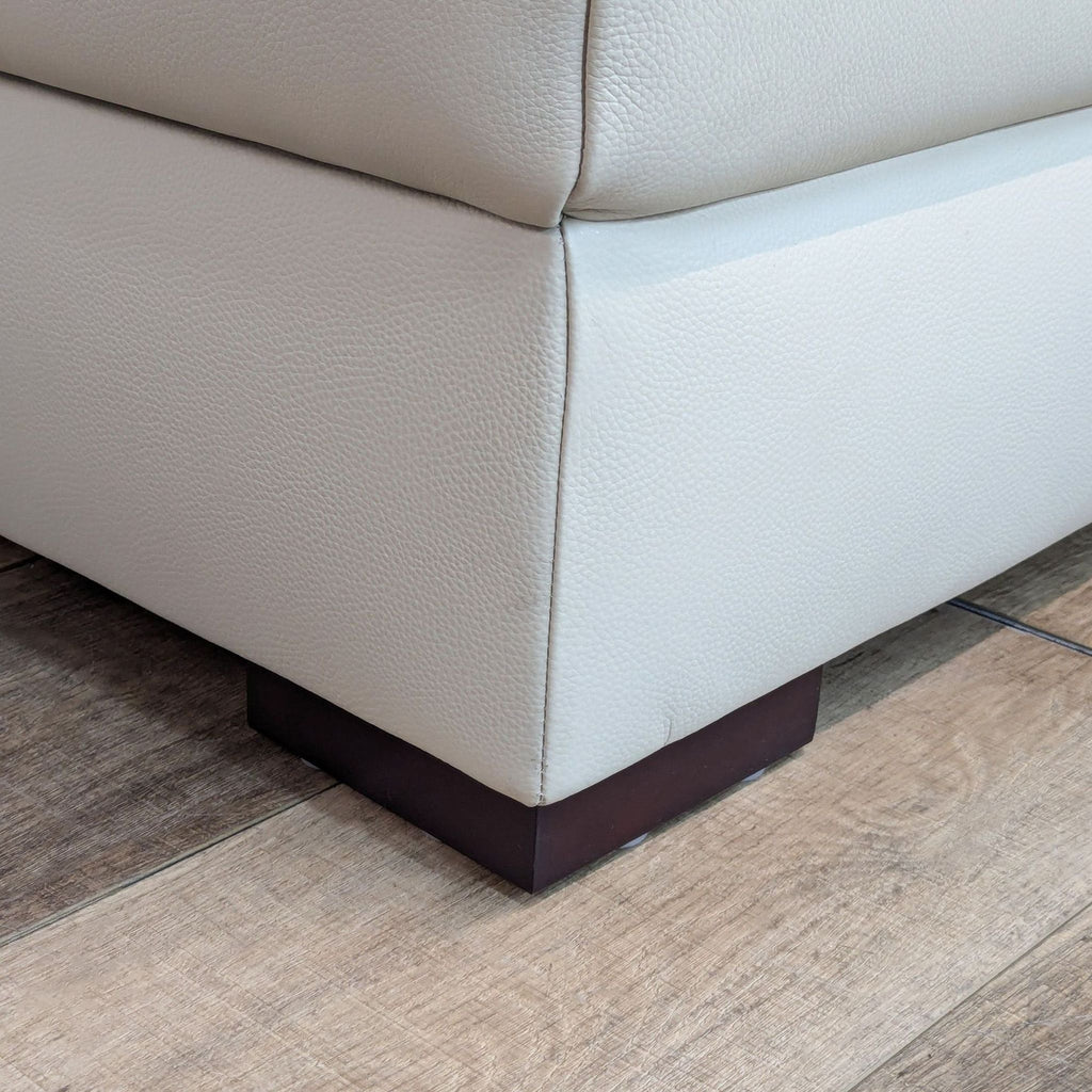 Macy’s Nevio Leather Reclining Sectional with Chaise and Articulating Headrests