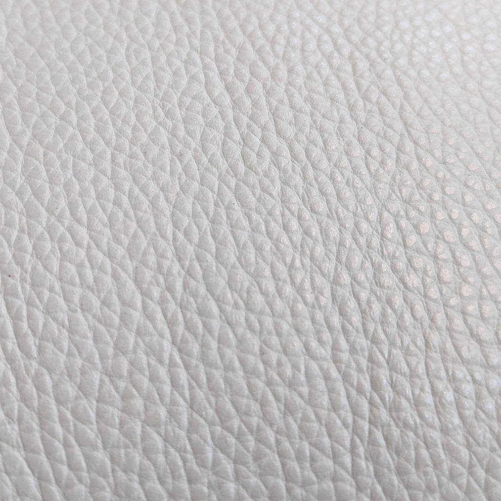 Macy’s Nevio Leather Reclining Sectional with Chaise and Articulating Headrests