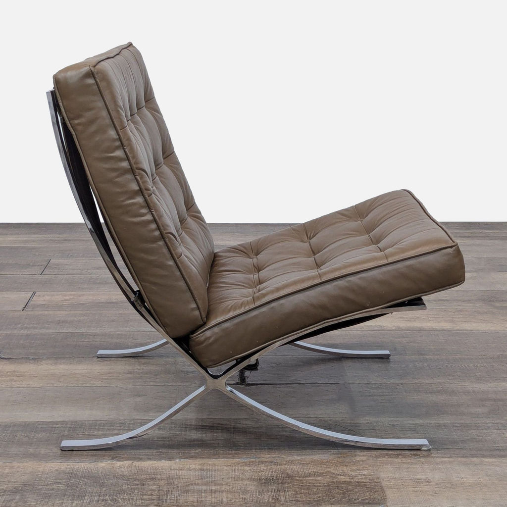 Side view of a Reperch lounge chair, featuring leather cushions and chrome accents.