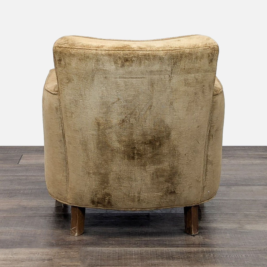 Back view of Fisher Weisman chenille lounge chair, showcasing its simple wood legs.