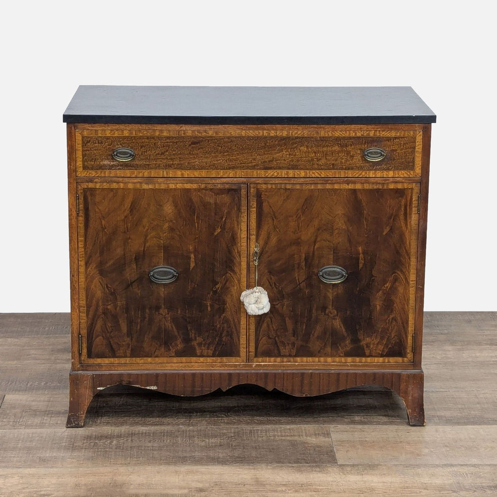 Two-door buffet with inlaid design, single drawer, and slate-like top.