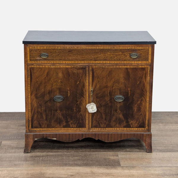 Two-door buffet with inlaid design, single drawer, and slate-like top.