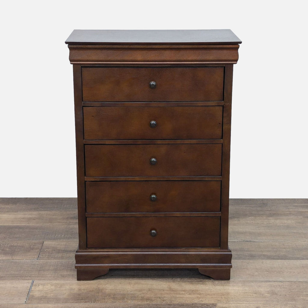 Reperch dresser with five visible drawers, single metal pulls, and a hidden top drawer.