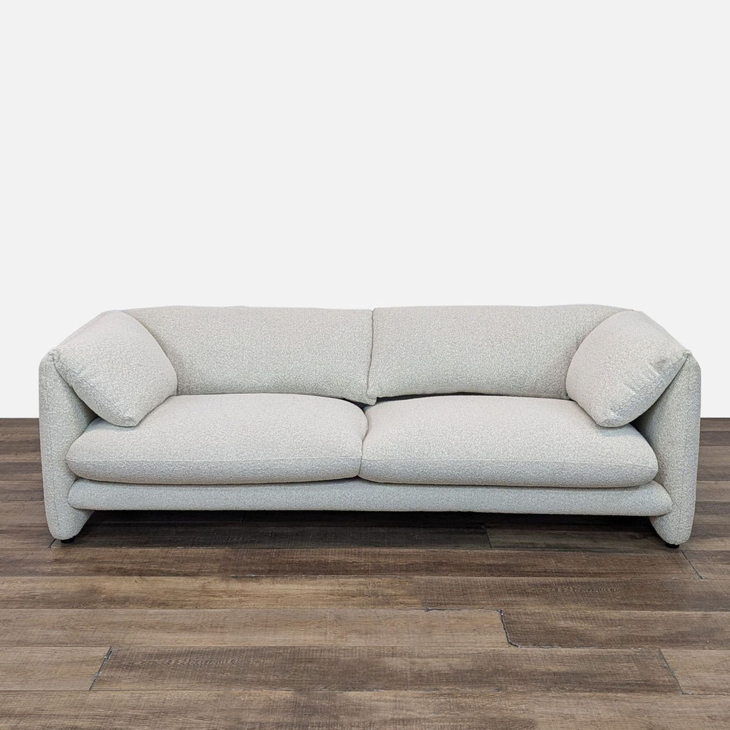 Front view of the Lucas 3-seat sofa by Castlery in white Bouclè fabric on wooden floor.