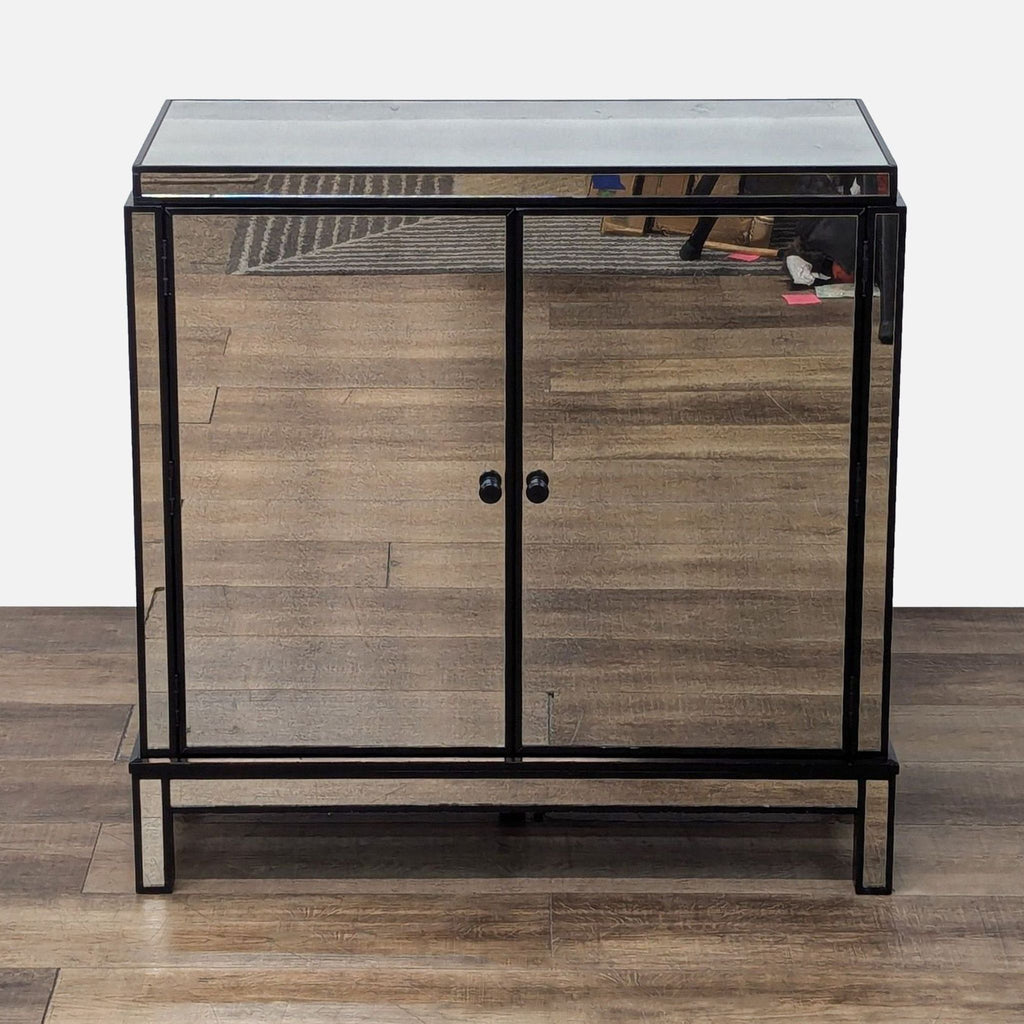 Mirrored cabinet with dual doors reflecting a room, standing on wooden floor.